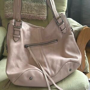 Excellent condition bag, clean, fits a lot! Only carried it a few times.